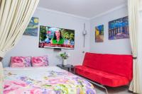 A bed or beds in a room at Camp Nou, Europa Fira - modern two-bedroom apartment with heating