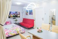 A television and/or entertainment centre at Camp Nou, Europa Fira - modern two-bedroom apartment with heating