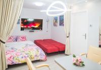 A bed or beds in a room at Camp Nou, Europa Fira - modern two-bedroom apartment with heating