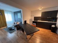Telewizja i/lub zestaw kina domowego w obiekcie Mon Palmier Grand Appartement Parking Un-Séjour-à-Part
