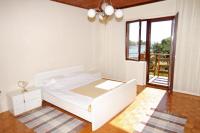Postel nebo postele na pokoji v ubytování Apartments by the sea Privlaka, Zadar - 666