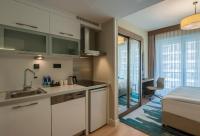 Postel nebo postele na pokoji v ubytování The Superior Living Batışehir