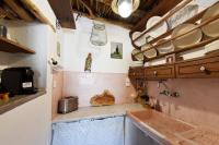 Kuchyň nebo kuchyňský kout v ubytování Giourgas Cottage Milos Island