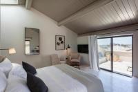 Posteľ alebo postele v izbe v ubytovaní Palazzo Tafuri Boutique Hotel