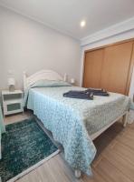 Postel nebo postele na pokoji v ubytování Alojamento King´s Village
