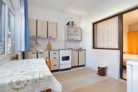 Kuchyňa alebo kuchynka v ubytovaní Apartment Okrug Gornji 1069a