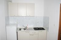 Kuchyňa alebo kuchynka v ubytovaní Apartments by the sea Mandre, Pag - 4095