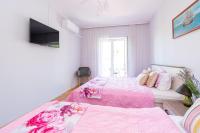 Łóżko lub łóżka w pokoju w obiekcie Triple Room Pasman 4309g