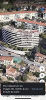an overhead view of a large building in a city at Une terrasse sur Monaco logement 2 chambre in Beausoleil