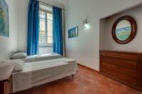 A bed or beds in a room at Ricasoli 17 G