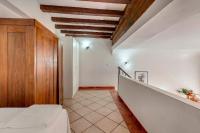 A bed or beds in a room at Ricasoli 17 G