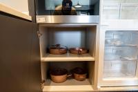 a cupboard with three bowls in it at Superior, classy residence,7&#47;24 Security,2 bedroom ( Benesta 205 ) in Istanbul