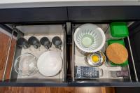 a drawer filled with dishes and other kitchen utensils at Superior, classy residence,7&#47;24 Security,2 bedroom ( Benesta 205 ) in Istanbul