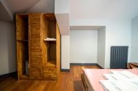 a bedroom with a bed and a wooden cabinet at Superior, classy residence,7&#47;24 Security,2 bedroom ( Benesta 205 ) in Istanbul