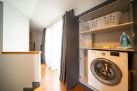 a washing machine in a laundry room with a window at Superior, classy residence,7&#47;24 Security,2 bedroom ( Benesta 205 ) in Istanbul