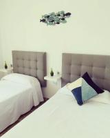 Posteľ alebo postele v izbe v ubytovaní Rancho Suizo 852