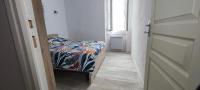 Posteľ alebo postele v izbe v ubytovaní Appartement Le république idéalement situé.