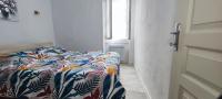 Posteľ alebo postele v izbe v ubytovaní Appartement Le république idéalement situé.