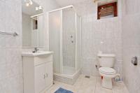 a bathroom with a toilet and a shower and a sink at Apartments with a parking space Bibinje, Zadar - 5753 in Bibinje