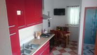 Cuisine ou kitchenette dans l&#39;&eacute;tablissement Apartments by the sea Sukosan, Zadar - 5905