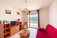 Televízia a/alebo spoločenská miestnosť v ubytovaní Apartments by the sea Tri Zala, Korcula - 4346