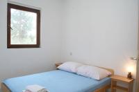 Posteľ alebo postele v izbe v ubytovaní Apartments by the sea Basina, Hvar - 4599