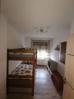 Posteľ alebo postele v izbe v ubytovaní Apartmani G&E