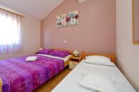 Posteľ alebo postele v izbe v ubytovaní Apartments with parking spaces Bibinje, Zadar - 5800
