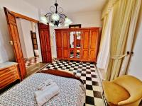 Posteľ alebo postele v izbe v ubytovaní Velez Nazari Casa Molina