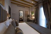 Posteľ alebo postele v izbe v ubytovaní Hotel La Malvasía