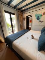 Posteľ alebo postele v izbe v ubytovaní Hotel La Malvasía