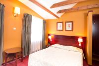 Ein Bett oder Betten in einem Zimmer der Unterkunft Meduza Hotel &amp; Spa
