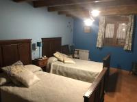 Posteľ alebo postele v izbe v ubytovaní PUENTECUERVO