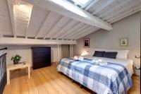 Posteľ alebo postele v izbe v ubytovaní Zita Apartment by Mamo Florence