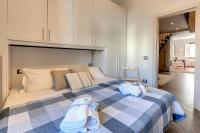Posteľ alebo postele v izbe v ubytovaní Zita Apartment by Mamo Florence