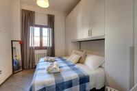 Posteľ alebo postele v izbe v ubytovaní Zita Apartment by Mamo Florence