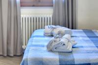 Posteľ alebo postele v izbe v ubytovaní Zita Apartment by Mamo Florence