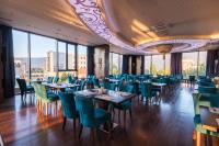 Veitingastaður eða matsölustaður á Malak Regency Hotel