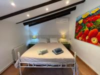 Postel nebo postele na pokoji v ubytování Villa Can Guillo Pollensa