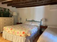 Postel nebo postele na pokoji v ubytování Villa Can Guillo Pollensa