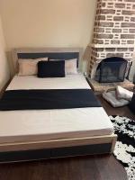A bed or beds in a room at FOREST VIEW ELISAVET