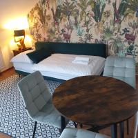 A bed or beds in a room at Fit Paradise Apartman