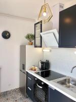 Kuchyňa alebo kuchynka v ubytovaní Luxueux Appartement Trouville/Deauville avec balcon