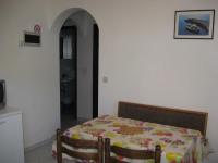 a bedroom with a bed in a room with a bathroom at Apartments with a parking space Rabac, Labin - 7442 in Rabac