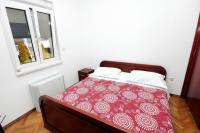 Posteľ alebo postele v izbe v ubytovaní Family friendly apartments with a swimming pool Rogoznica - 7557