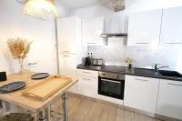 Una cocina o zona de cocina en Appartements Premium en Hyper Centre Ville