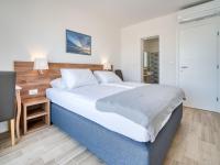 Łóżko lub łóżka w pokoju w obiekcie Holiday Home Villa Vali 2 by Interhome