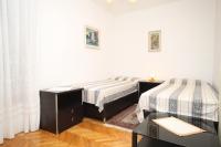Posteľ alebo postele v izbe v ubytovaní Apartments with WiFi Mali Losinj (Losinj) - 7992