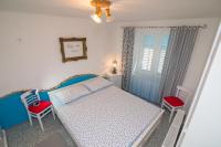 Posteľ alebo postele v izbe v ubytovaní Apartments by the sea Veli Losinj, Losinj - 7959