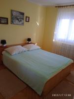 Posteľ alebo postele v izbe v ubytovaní Apartments with a parking space Lovran, Opatija - 7713